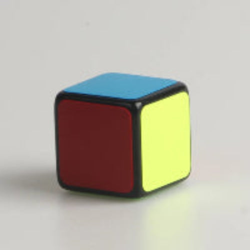 Close-up of colorful 1x1 Speed Cube showing red, yellow, and blue sides
